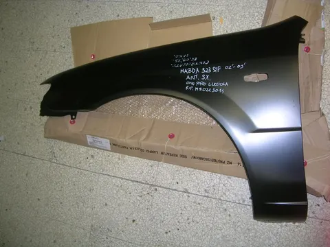 Parafango Anteriore Sinistro Con Foro Lucciola  Mazda 323 S/F 2000-2003